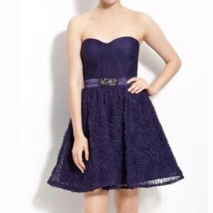 Adrianna Papell Woman’s Purple Rosette Mini Dress. Size 14W.